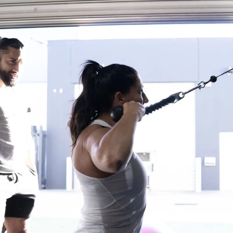 Member on the cable pulldown at Kaos Fitness